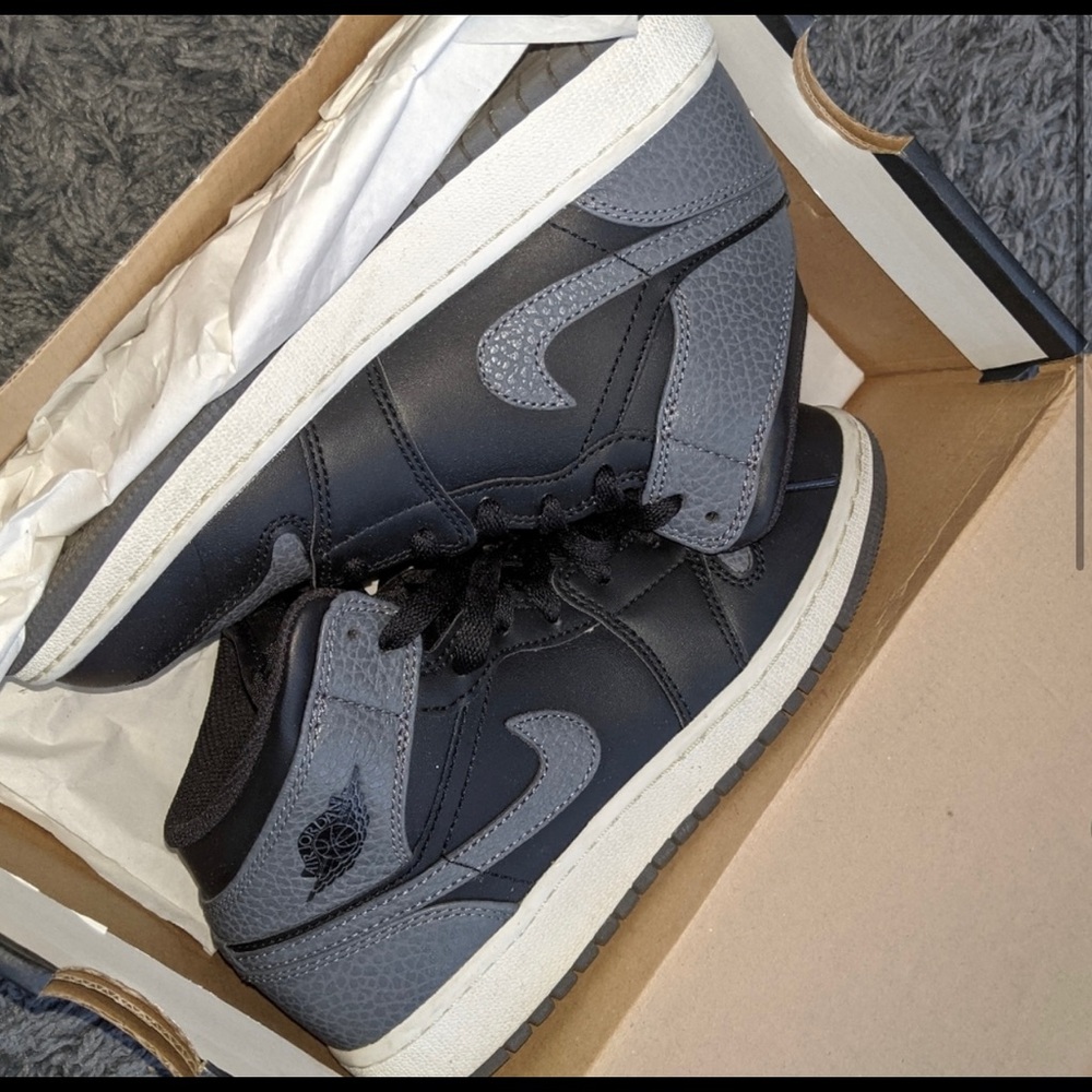 Air Jordan 1’s, size 4.5 youth = 6 womens. Very gently used. Grey and Black